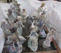 Ten Lladro figures including young girls with flowers and geese together with other figures