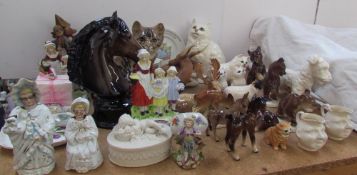 A Beswick stag 954 together with a Royal Dux stag, Beswick cats, Russian bears,