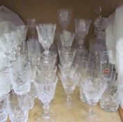 A collection of glasswares including crystal decanters,