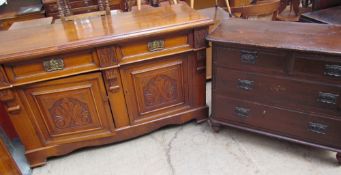 An Edwardian walnut sideboard with two draws and two cupboards,