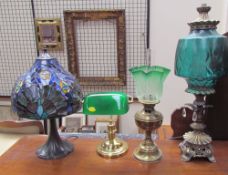 A Tiffany style table lamp together with another table lamp,