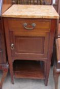 An Edwardian mahogany marble topped washstand with a frieze drawer and cupboard on square tapering