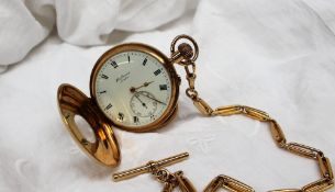 An 18ct yellow gold half hunter keyless wound pocket watch,