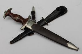 A German Third Reich SA Dress Dagger, with a hardwood grip, inset with SA emblem and eagle,
