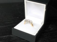 A three stone diamond ring,