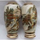 A pair of Japanese satsuma pottery vases decorated with geisha under a cherry blossom tree and