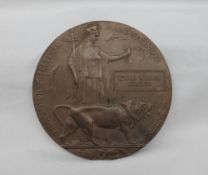 A World War I bronze death plaque,