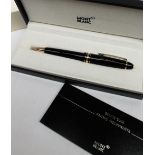 A Montblanc Meisterstuck ballpoint pen, in black, the presentation case printed FIFA,