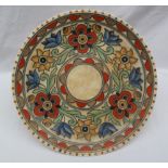 A Crown Ducal, Charlotte Rhead pottery charger decorated with orange,