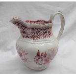 A Swansea pottery jug decorated in red with shells and flowers, 18.