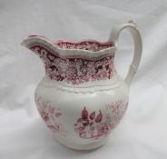 A Swansea pottery jug decorated in red with shells and flowers, 18.