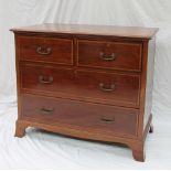 An Edwardian mahogany chest,