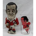 A John Hughes pottery Grogg of Phil Bennett in Wales kit, holding a ball, inscribed Grand Slam 1976,