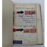 A stamp album containing world stamps including the first transatlantic Canadian air mail,