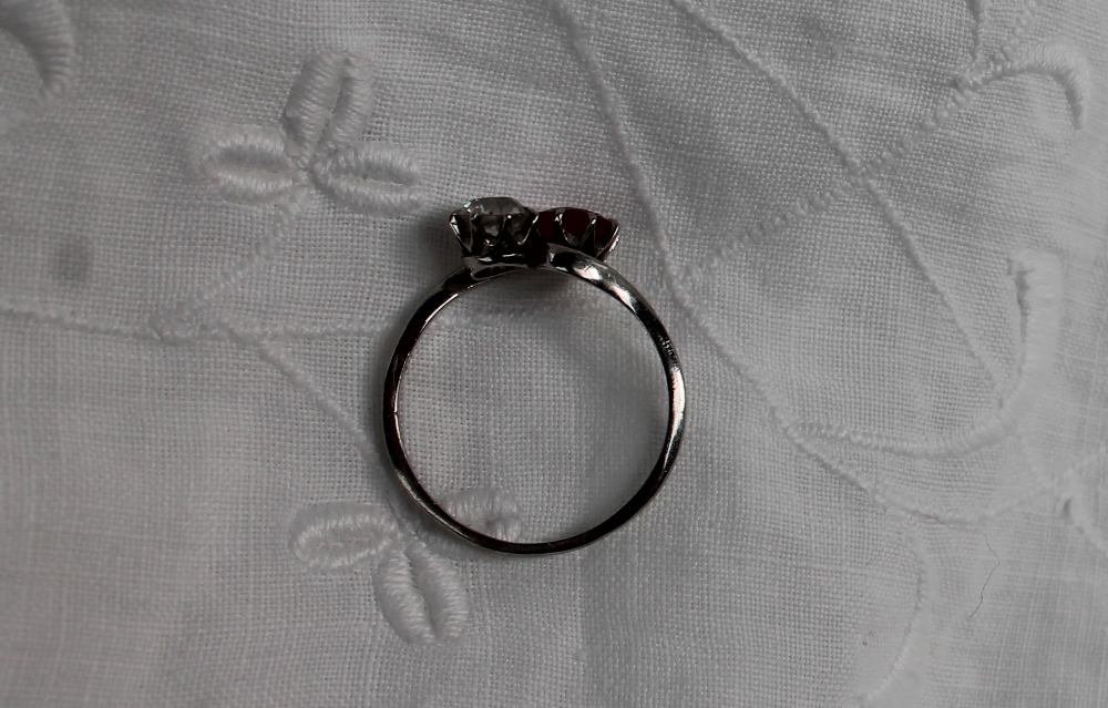 A ruby and diamond crossover ring, the round old cut diamond approximately 0. - Image 3 of 4