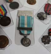 A French colonial medal for active service in the colonies, with "Extreme Orient" clasp,