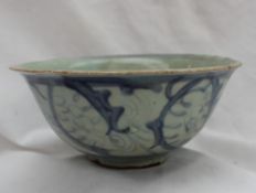 A pre 19th century Chinese bowl, of flared form, decorated with stylised leaves,
