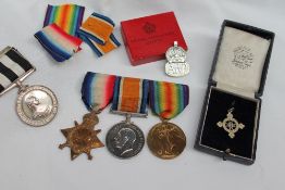 A Set of three World War I medals including the 1914-15 Star, The War Medal and the Victory Medal,