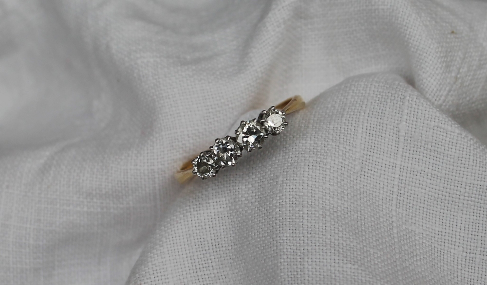 A four stone diamond ring,