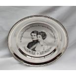 An Elizabeth II hallmarked silver commemorative salver engraved to the centre,