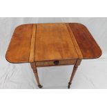 A 19th century mahogany pembroke / games table, the rectangular top with drop flaps,