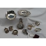 An Elizabeth II silver pierced dish of oval form, London, 1975 together with silver dishes,