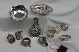 An Elizabeth II silver pierced dish of oval form, London, 1975 together with silver dishes,