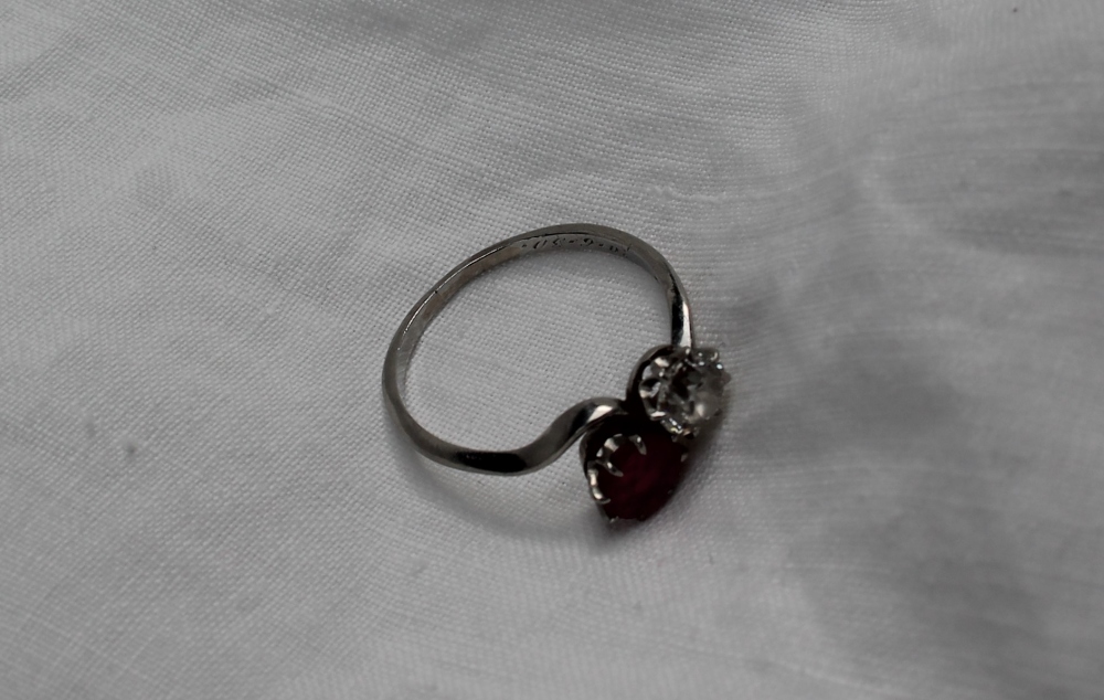 A ruby and diamond crossover ring, the round old cut diamond approximately 0. - Image 4 of 4