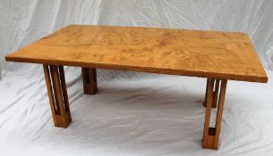 A 20th century pollarded oak coffee table, the rectangular top on four cluster column legs,