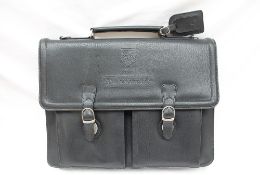 A Falcon black 'leather' briefcase,