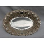 A Victorian Scottish silver dish of oval form, decorated with masks, scrolls and leaves, Glasgow,