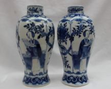 A pair of Chinese blue and white porcelain vases of inverted baluster form,