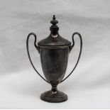 A George V silver miniature trophy cup and cover, of tapered form on a spreading foot, Birmingham,
