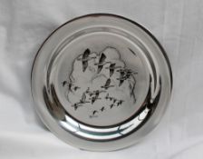 An Elizabeth II silver "The Peter Scott Christmas Plate 1975",