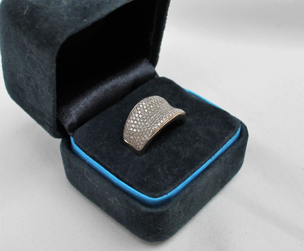 A 9ct yellow gold pave set diamond ring,