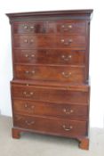 A George III mahogany chest on chest, the moulded dentil cornice above a blind fretwork frieze,