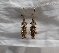 A pair of 9ct yellow gold drop earrings, in the form of clowns, approximately 4.