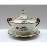 A Swansea porcelain sauce tureen, cover and stand, locally decorated with sprays of garden flowers,