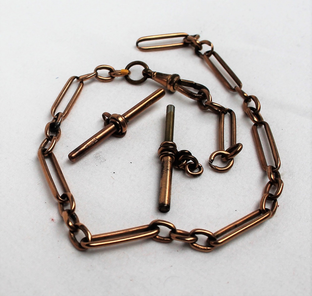 A 9ct yellow gold Albert watch chain, with oval links and a T bar, approximately 23.