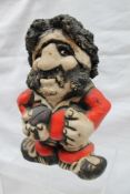 A John Hughes pottery Grogg of a rugby player in Wales kit with No.