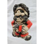 A John Hughes pottery Grogg of a rugby player in Wales kit with No.