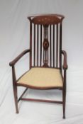 An Art Nouveau mahogany elbow chair,