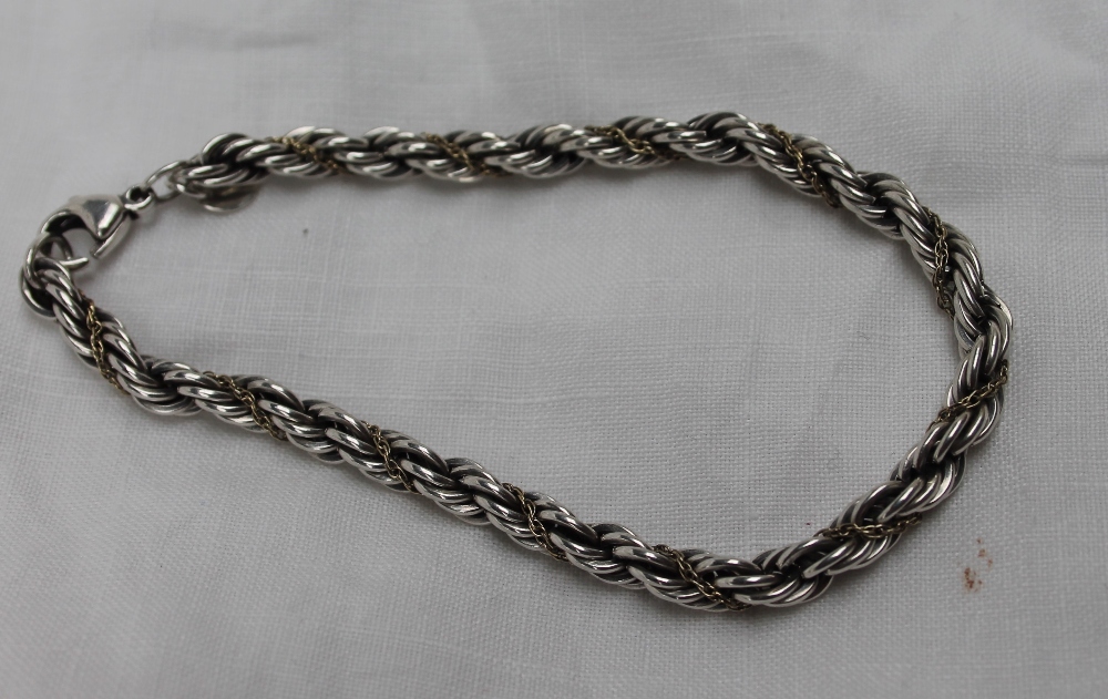 A Tiffany & Co. silver and 18ct yellow gold rope twist bracelet, approximately 13. - Image 3 of 5