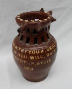 An early 20th century studio pottery puzzle jug,