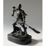 A modern bronze model of a Samurai with a Halberg, on an oval base,