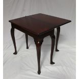 A 19th century mahogany tea table,