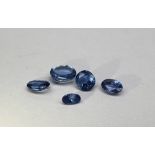 Five assorted loose sapphires, all light in colour, various cuts,