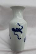 A Chinese porcelain baluster vase, painted with an interior scene depicting attending hand maidens,