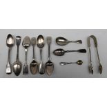 A set of four George III silver fiddle pattern tea spoons, London, 1819,