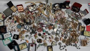 A large lot of costume jewellery including Lady's wristwatches, pendants, brooches, dress ring,